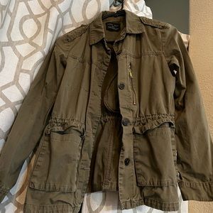 Used army green soft jacket in size small
